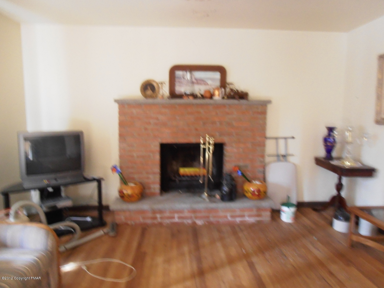 64 Pine Hill Road Mount Pocono, PA 18344 - Photo 3 of 6 Living Room fireplace