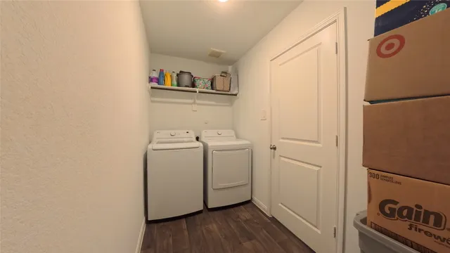 a utility room with dryer and washer