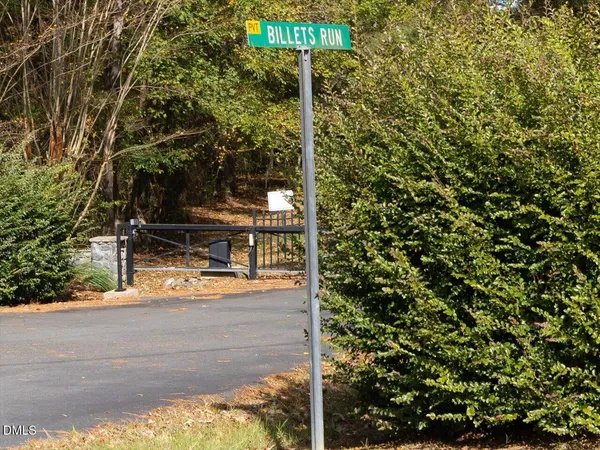 a view of a street with tree