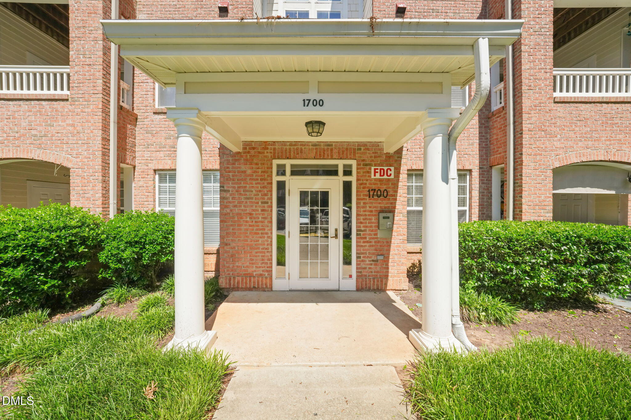 1700 Tiffany Bay Court, Unit 303 Raleigh, NC 27609 - Photo 28 of 29 Bldg entrance