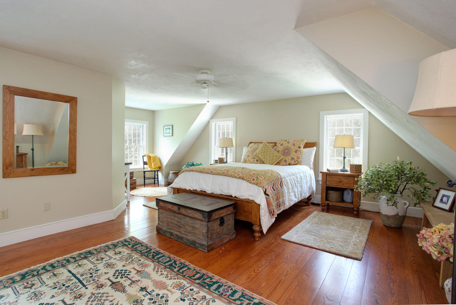 27 Oak Ridge Road East Sandwich, MA 02537 - Photo 31 of 57 a bedroom with a bed and wooden floor