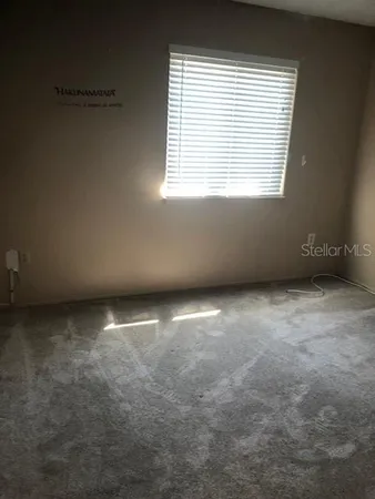 an empty room with a window