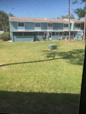 a view of an ocean with a big yard