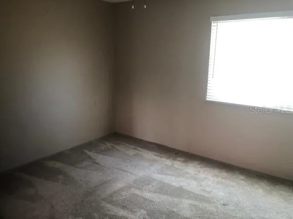 an empty room with a window