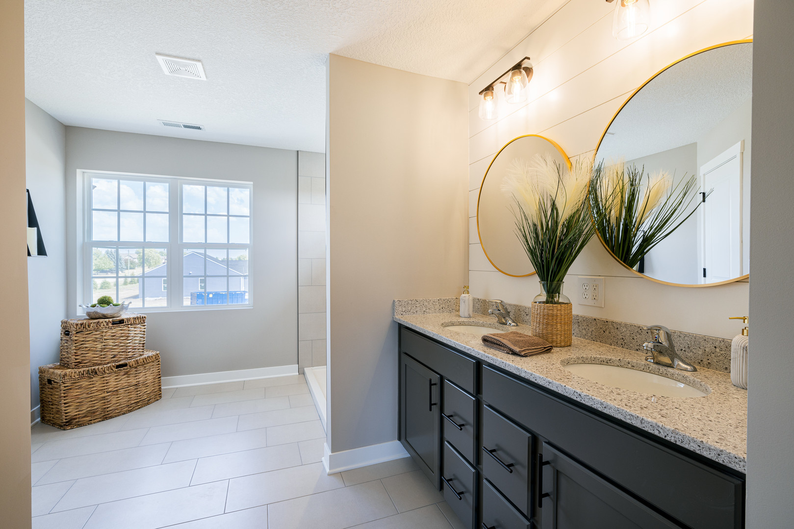 2-17 7th Street Silvis, IL 61282 - Photo 13 of 29 a bathroom with a granite countertop sink a mirror and a window