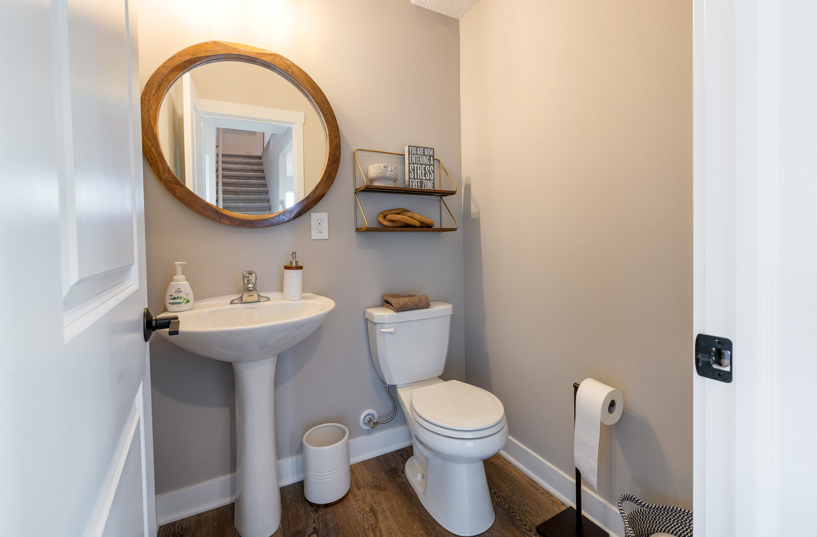 2-17 7th Street Silvis, IL 61282 - Photo 22 of 29 a bathroom with a toilet sink and mirror