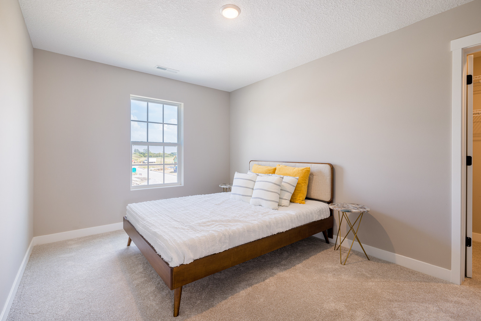 2-17 7th Street Silvis, IL 61282 - Photo 26 of 29 a bedroom with a bed and window