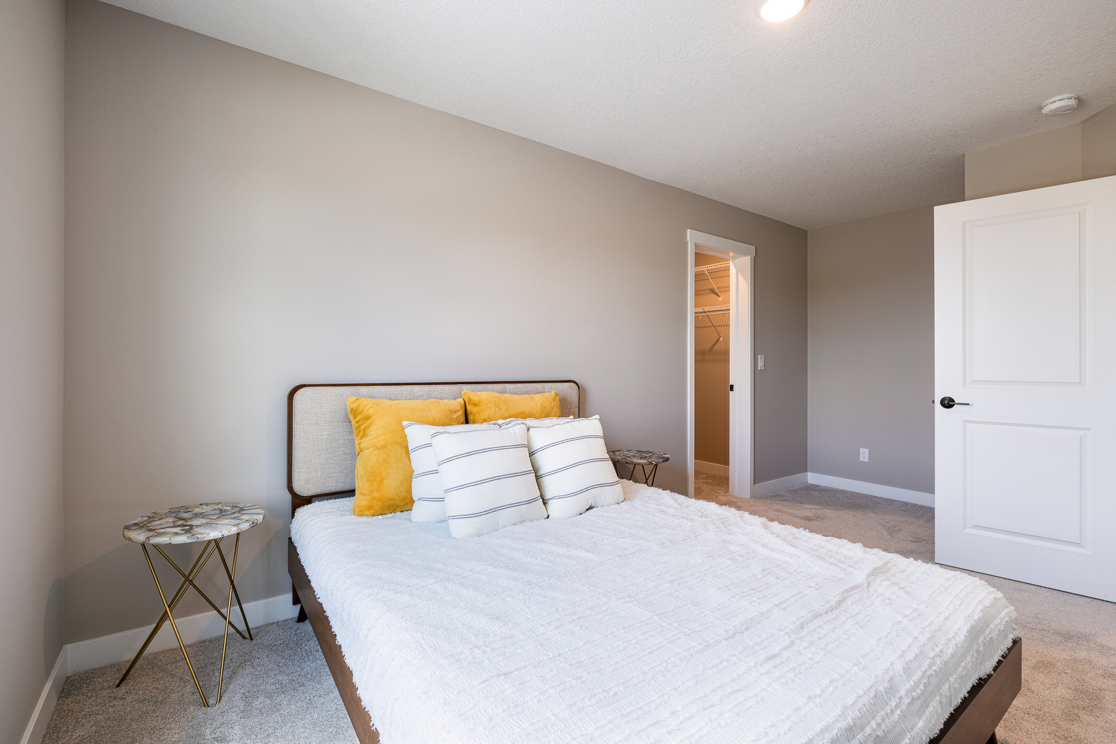 2-17 7th Street Silvis, IL 61282 - Photo 27 of 29 a bedroom with a bed and chair
