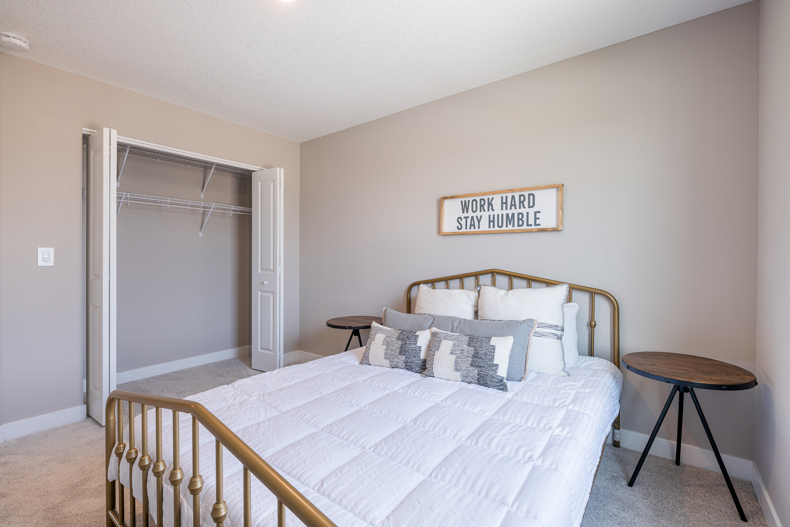 2-17 7th Street Silvis, IL 61282 - Photo 29 of 29 a bedroom with a bed and a chandelier