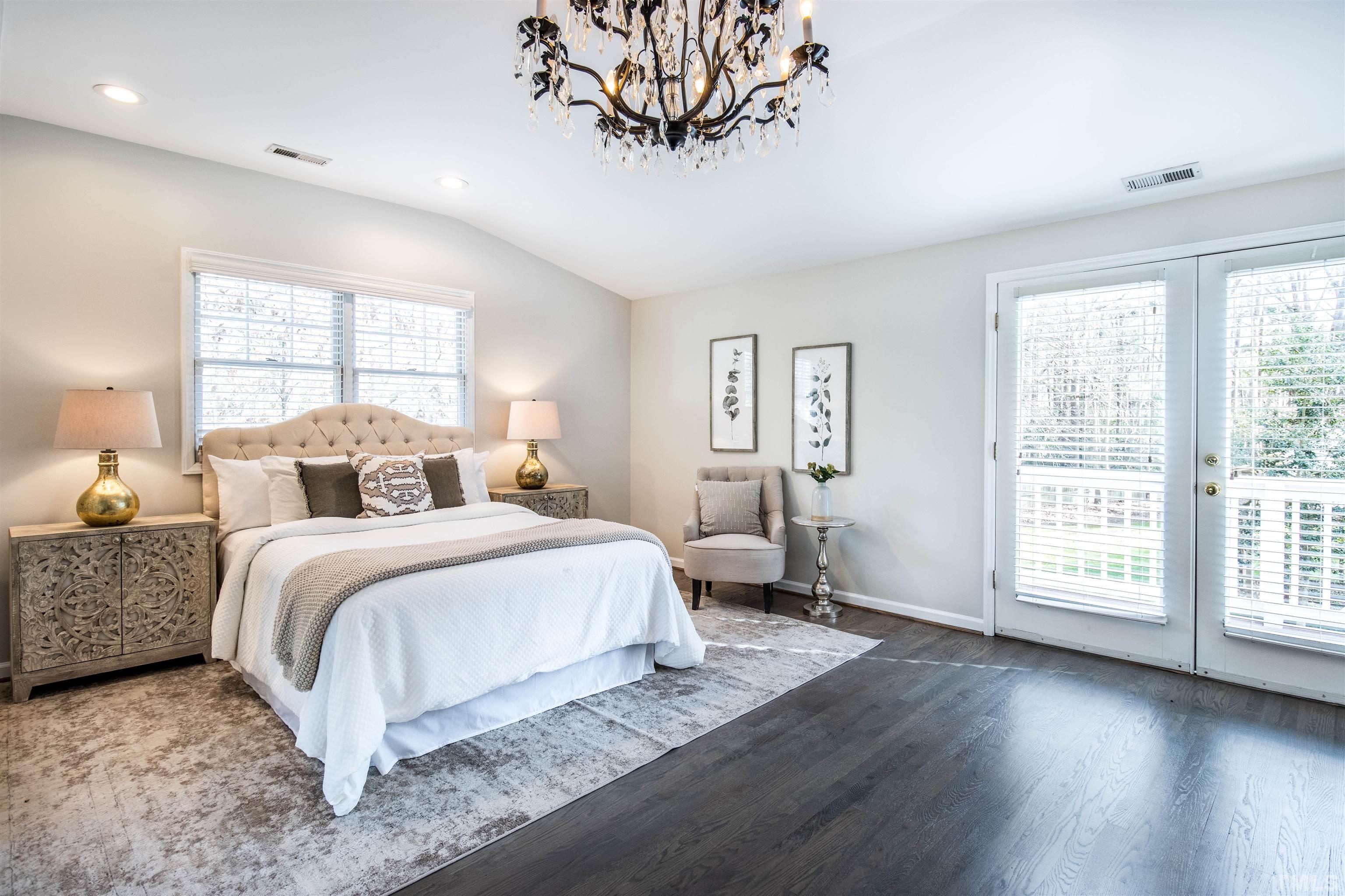 132 Benedict Lane Raleigh, NC 27614 - Photo 25 of 39 a bedroom with a large bed and a window