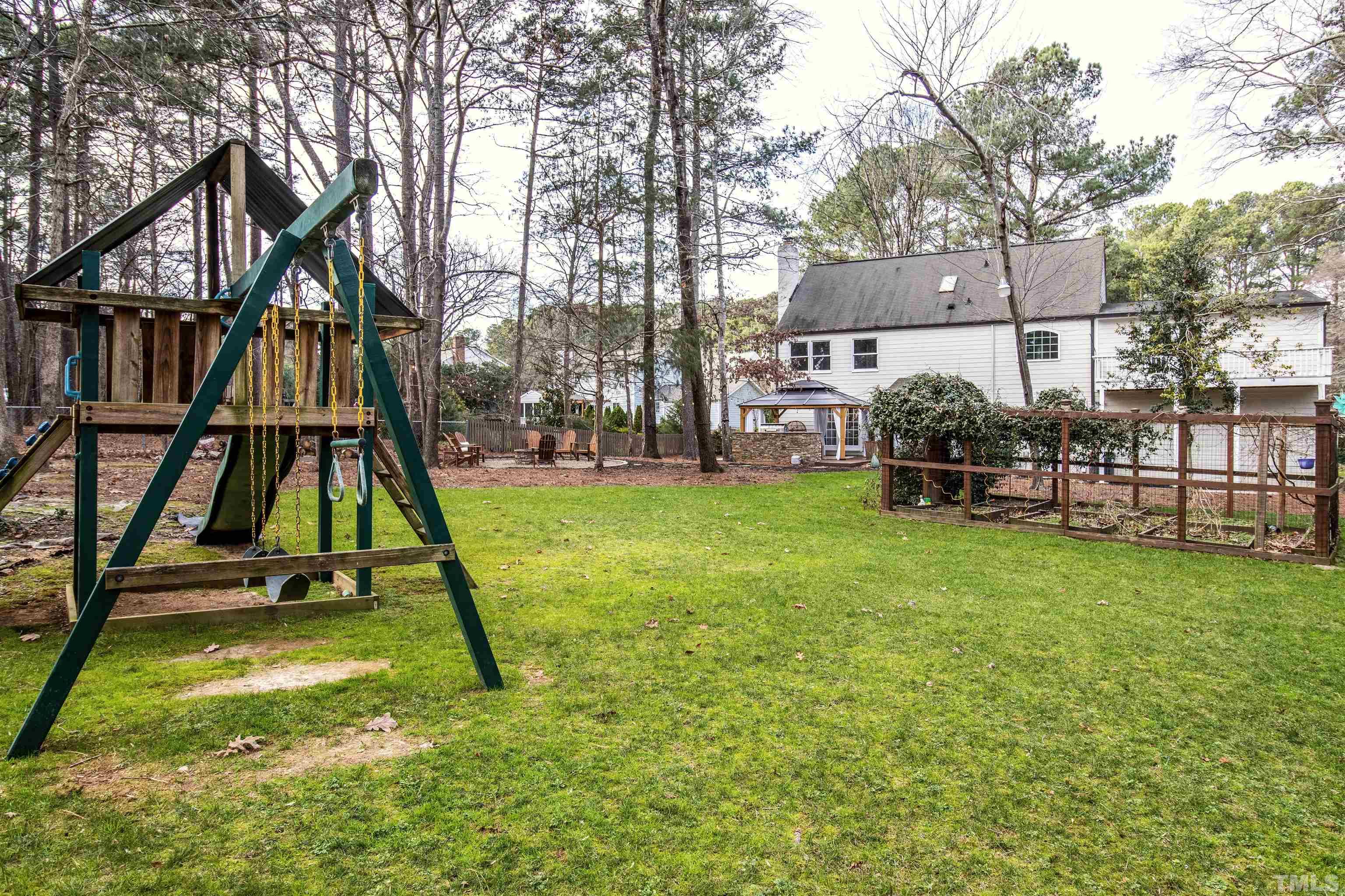 132 Benedict Lane Raleigh, NC 27614 - Photo 4 of 39 a view of a house with backyard