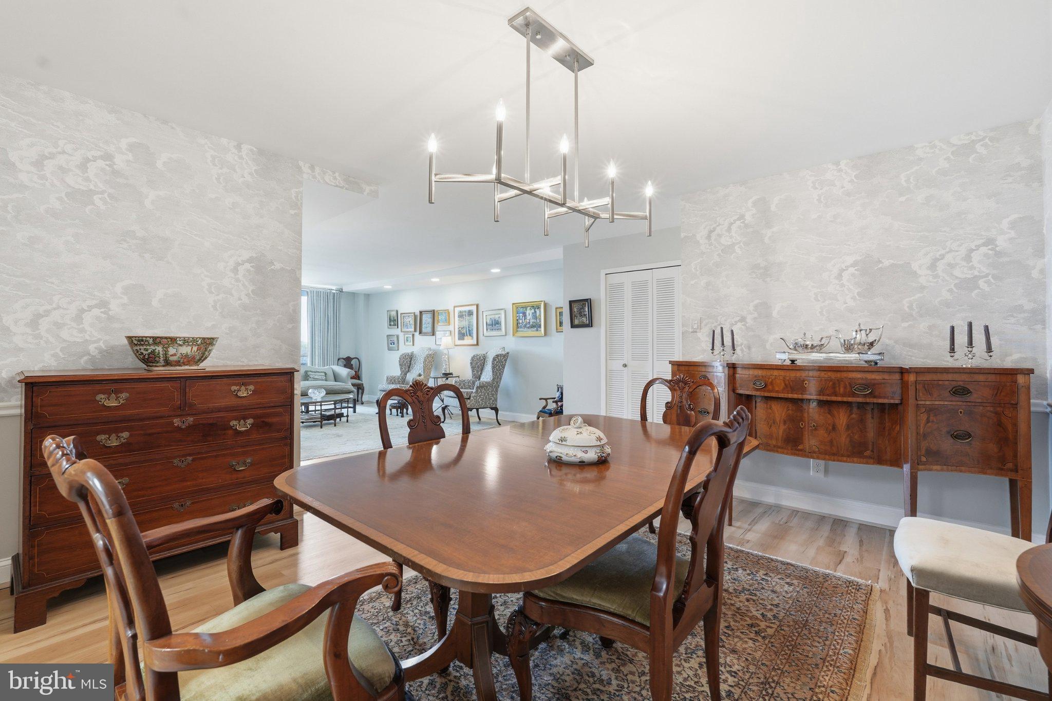 5101 River Road, Unit 1703 Bethesda, MD 20816 - Photo 19 of 57 Living room with chandelier