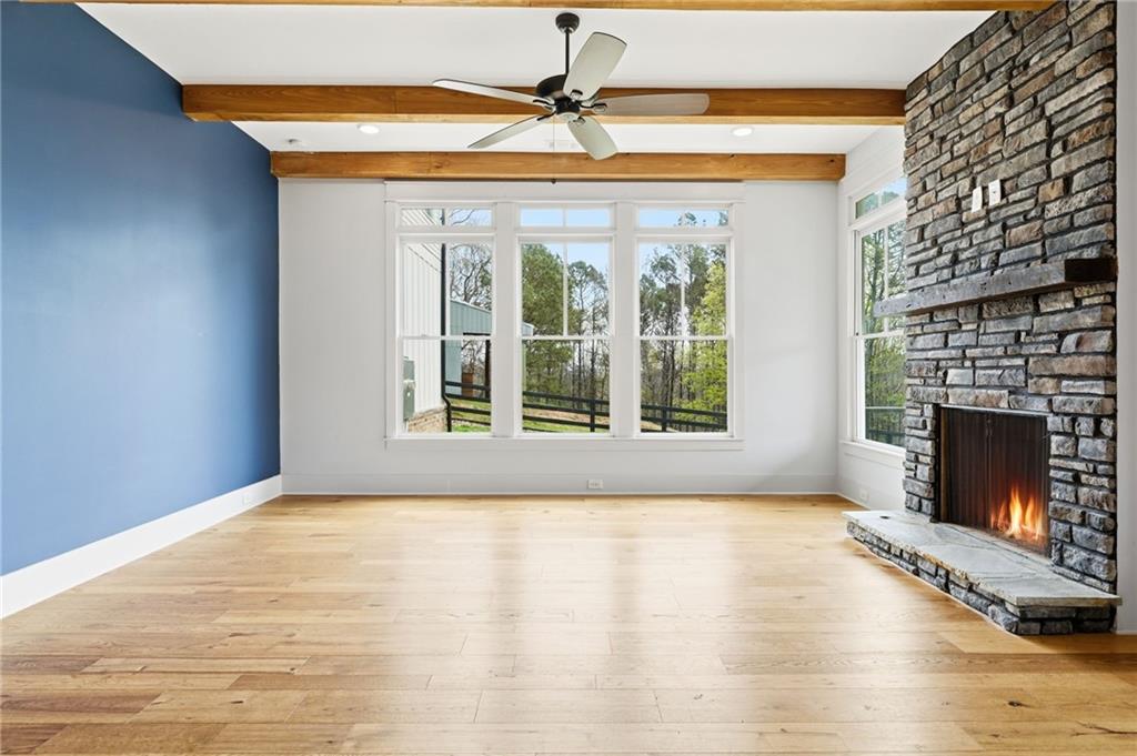 738 Overlook Trail Acworth, GA 30101 - Photo 32 of 94 a view of an empty room with a fireplace and a window