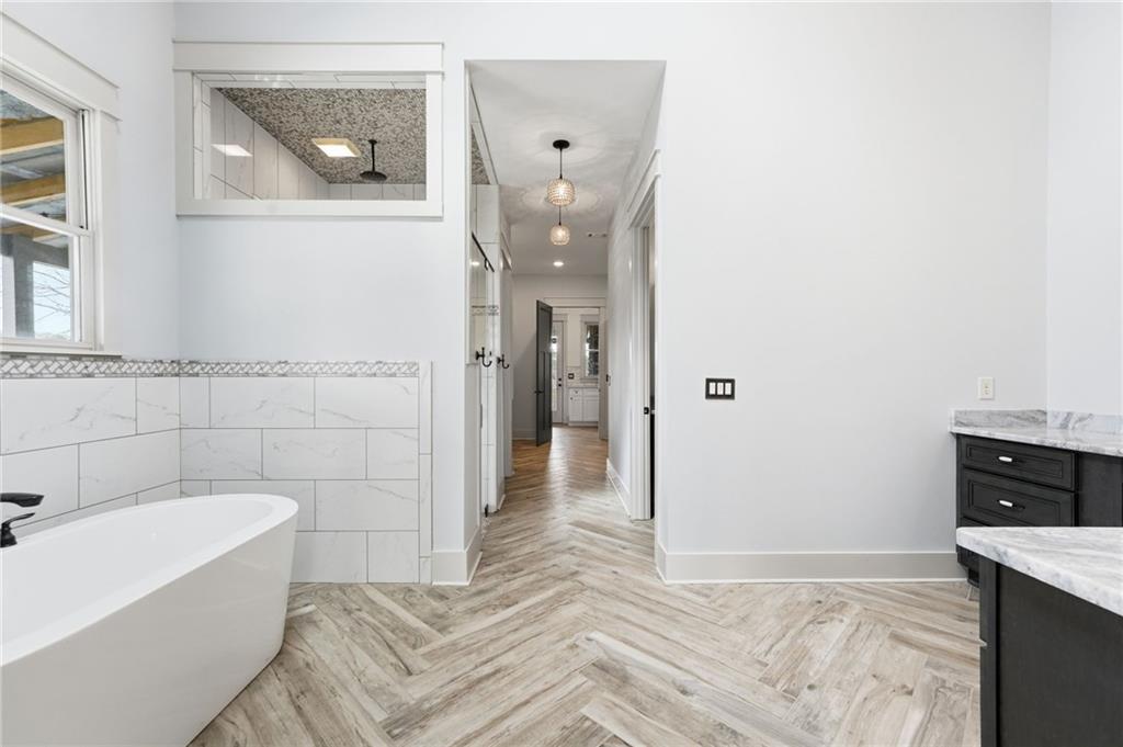 738 Overlook Trail Acworth, GA 30101 - Photo 34 of 94 a bathroom with a bathtub and shower