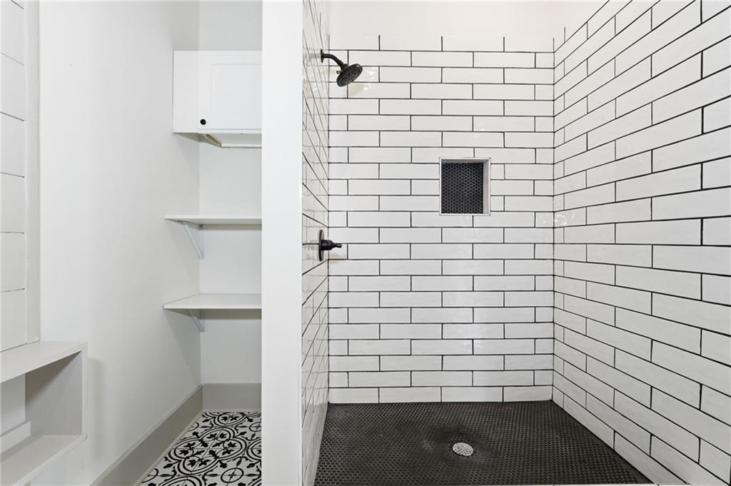 738 Overlook Trail Acworth, GA 30101 - Photo 49 of 94 a bathroom with a shower