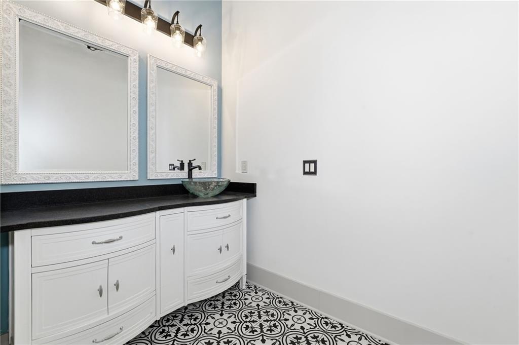 738 Overlook Trail Acworth, GA 30101 - Photo 50 of 94 a bathroom with a sink and a mirror