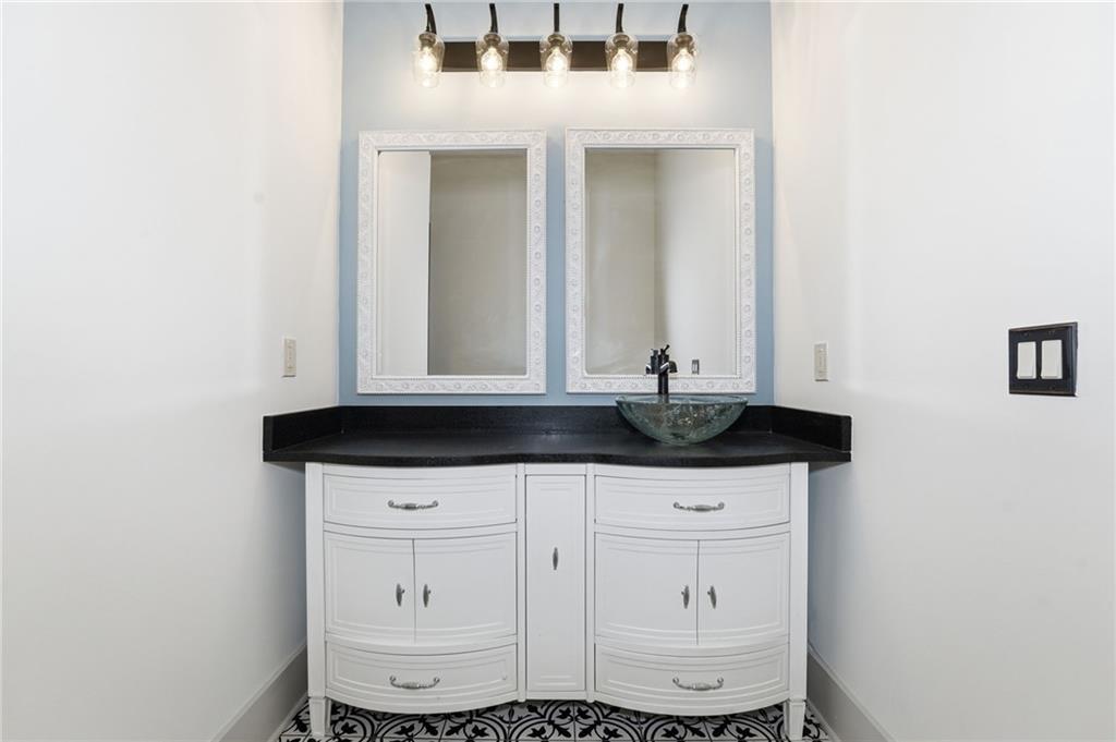 738 Overlook Trail Acworth, GA 30101 - Photo 51 of 94 a bathroom with a sink and a mirror