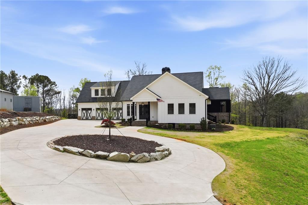 738 Overlook Trail Acworth, GA 30101 - Photo 6 of 94 a view of a house with swimming pool and a yard
