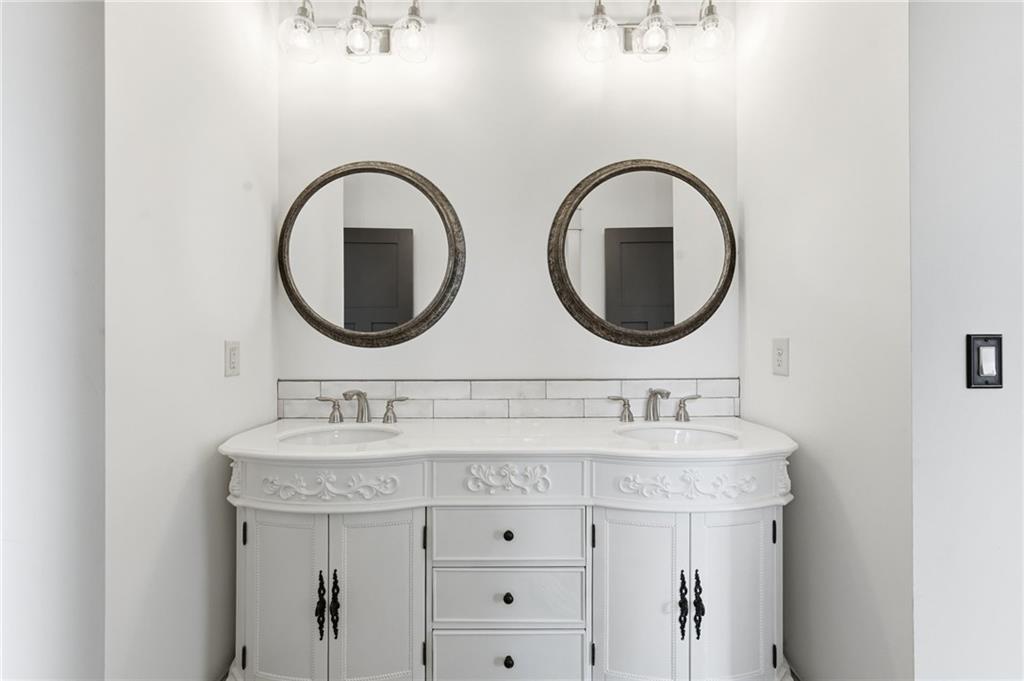 738 Overlook Trail Acworth, GA 30101 - Photo 67 of 94 a bathroom with a sink and a mirror