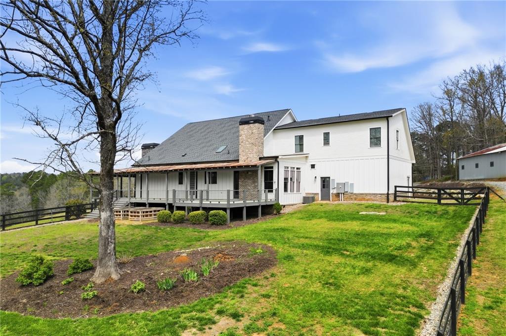 738 Overlook Trail Acworth, GA 30101 - Photo 80 of 94 a view of a house with backyard and sitting area