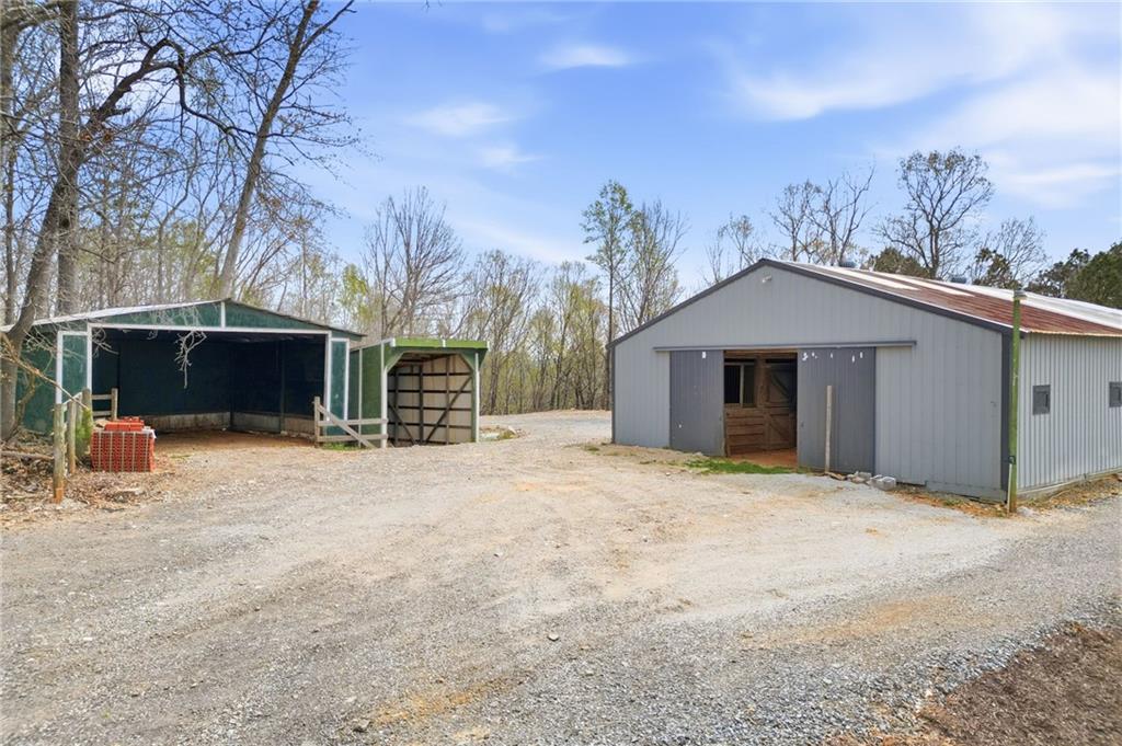 738 Overlook Trail Acworth, GA 30101 - Photo 83 of 94 a front view of a house with a yard and garage