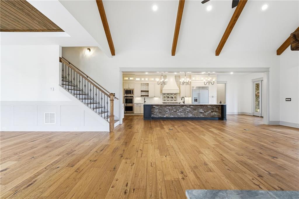 738 Overlook Trail Acworth, GA 30101 - Photo 9 of 94 a view of kitchen and hall with wooden floor