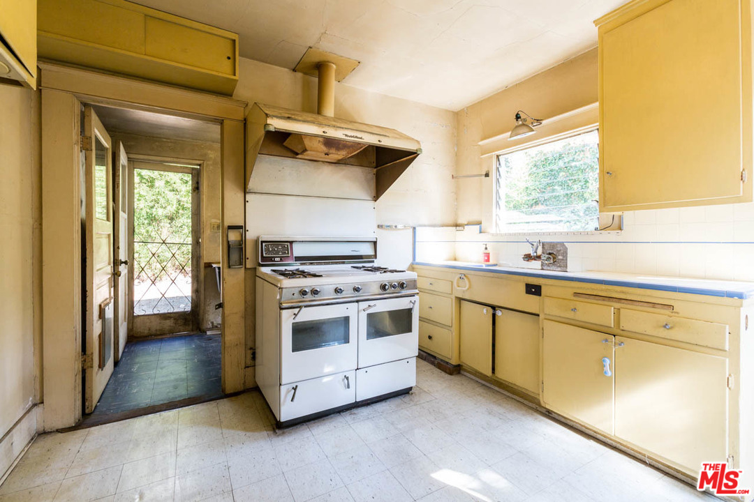 2300 Edgewater Terrace Los Angeles, CA 90039 - Photo 13 of 39 a kitchen with a stove and a sink