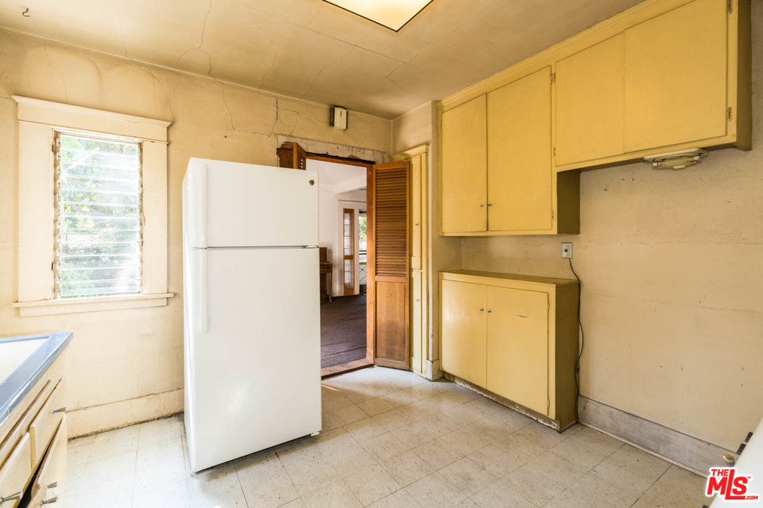 2300 Edgewater Terrace Los Angeles, CA 90039 - Photo 15 of 39 a utility room with refrigerator a washer and dryer
