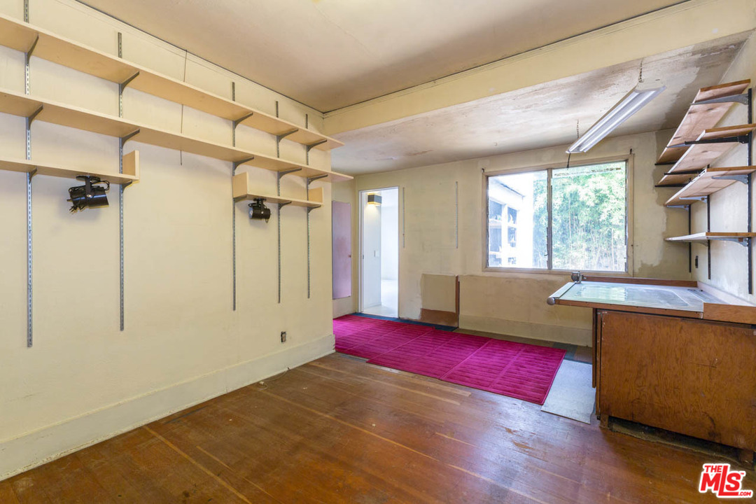 2300 Edgewater Terrace Los Angeles, CA 90039 - Photo 19 of 39 a view of empty room with window and wooden floor