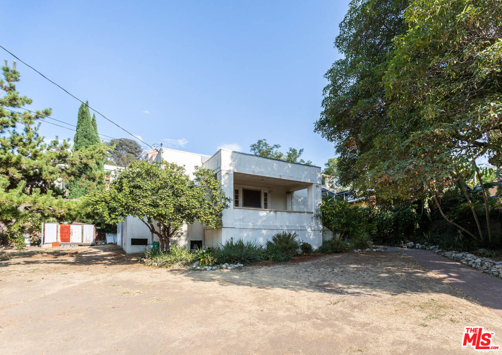 2300 Edgewater Terrace Los Angeles, CA 90039 - Photo 3 of 39 a front view of a house with a yard and garage