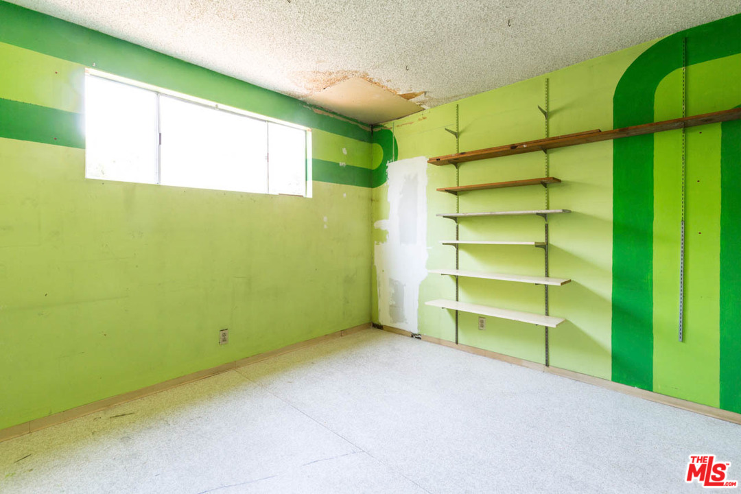 2300 Edgewater Terrace Los Angeles, CA 90039 - Photo 22 of 39 a room with walk in closet and window