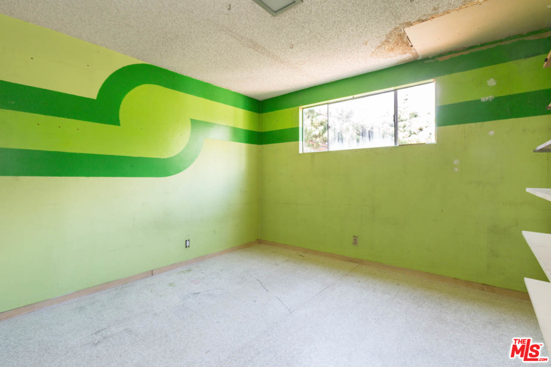 2300 Edgewater Terrace Los Angeles, CA 90039 - Photo 25 of 39 a view of a room with a window and ceiling fan