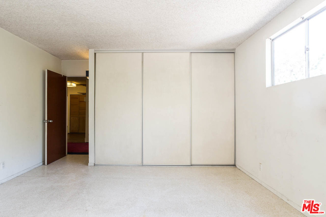 2300 Edgewater Terrace Los Angeles, CA 90039 - Photo 30 of 39 an empty room with windows and closet