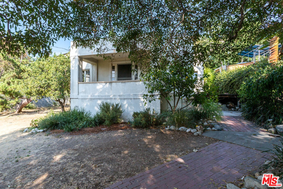 2300 Edgewater Terrace Los Angeles, CA 90039 - Photo 4 of 39 a front view of a house with garden