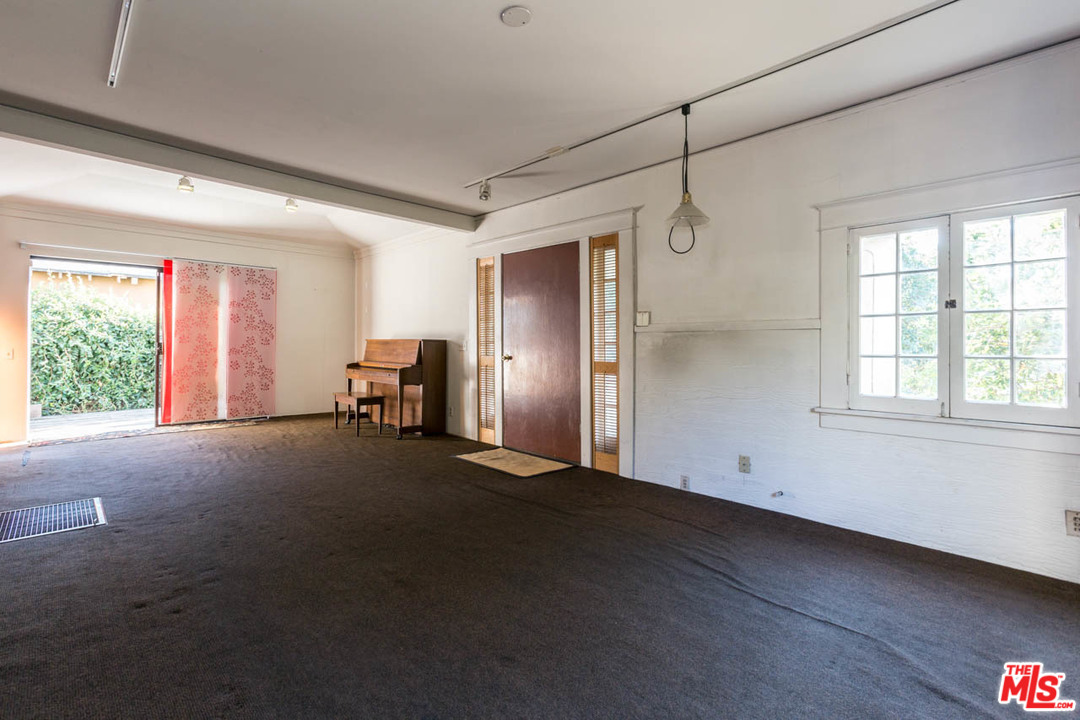 2300 Edgewater Terrace Los Angeles, CA 90039 - Photo 10 of 39 a view of a livingroom with furniture and a window