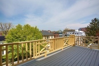 104 Walnut Street, Unit 2 Brookline, MA 02445 - Photo 3 of 4 a view of balcony with furniture