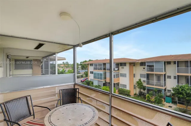 a room with furniture and window