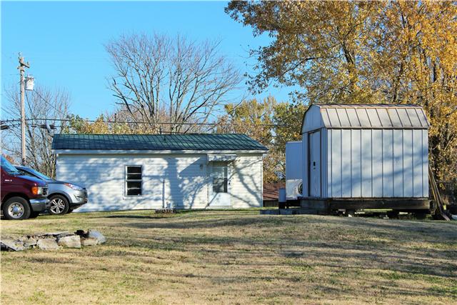 420 Linwood Road Watertown, TN 37184 - Photo 14 of 15 Rear view of the home shows convenient proximity to storage building which remains with property.