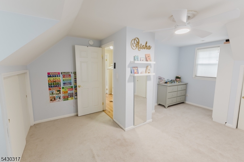 382 Martin Road Union, NJ 07083 - Photo 13 of 30 a view of room with cabinet and air conditioner vent