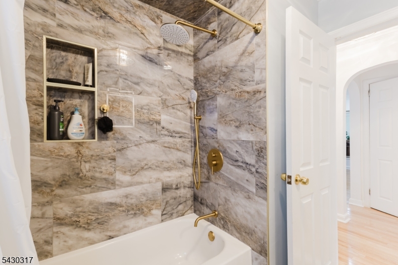 382 Martin Road Union, NJ 07083 - Photo 16 of 30 a bathroom with a shower and a sink