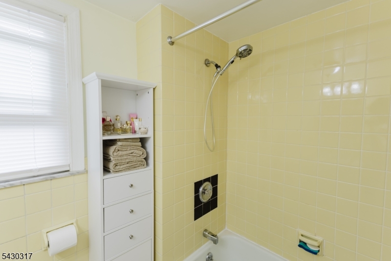 382 Martin Road Union, NJ 07083 - Photo 20 of 30 a bathroom with a sink and a shower