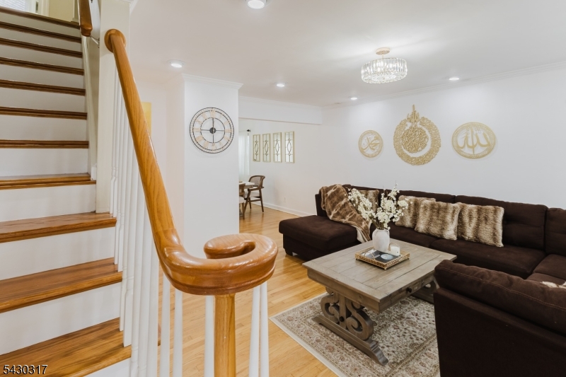 382 Martin Road Union, NJ 07083 - Photo 3 of 30 a living room with furniture and a wooden floor