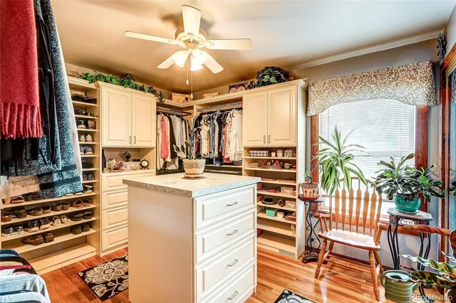 a kitchen with a stove a sink and a refrigerator