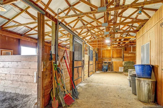 a backyard of a house with sofas