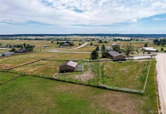 a view of a lake with a car parked