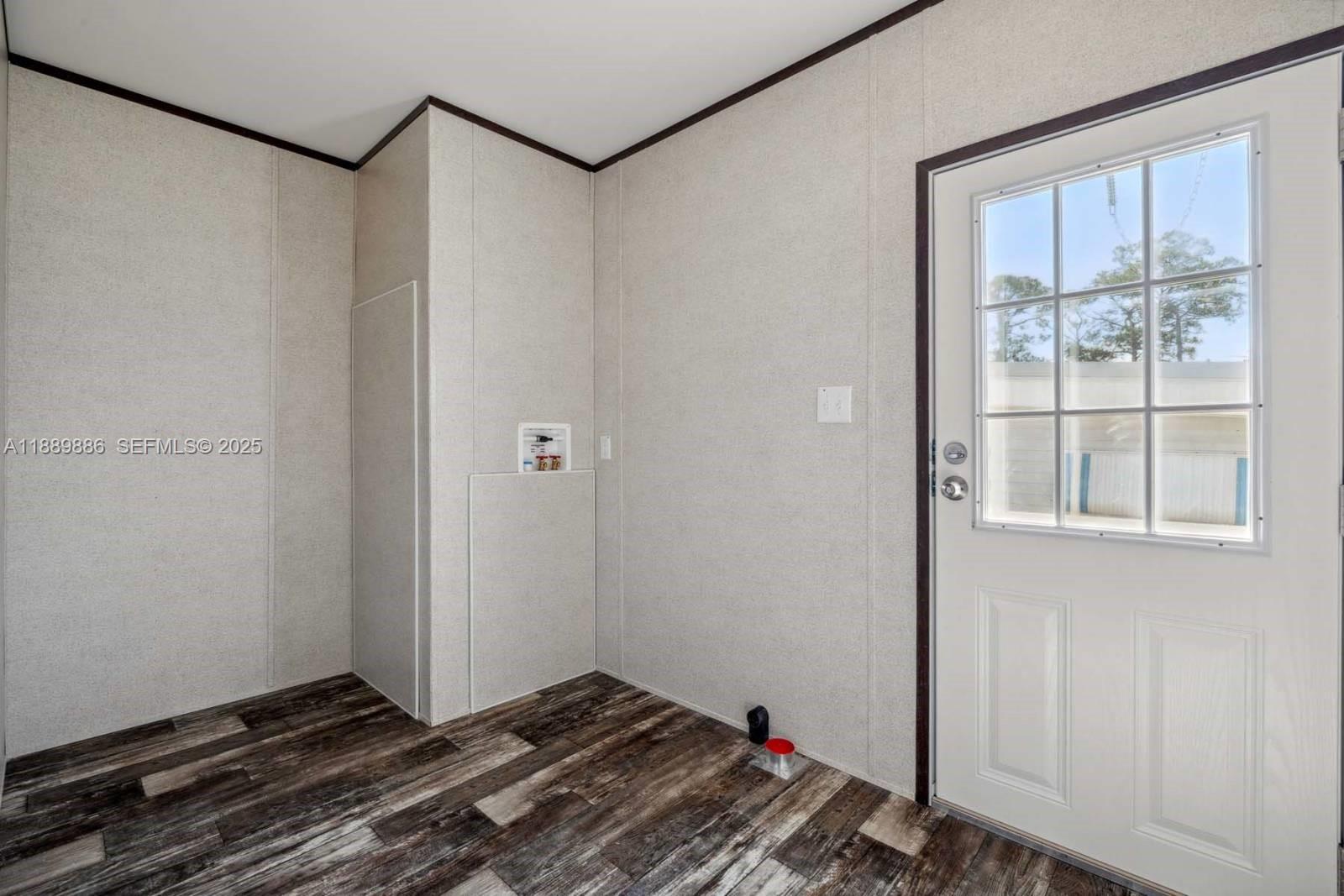 357 Horse Club Avenue Clewiston, FL 33440 - Photo 11 of 15 a view of utility room