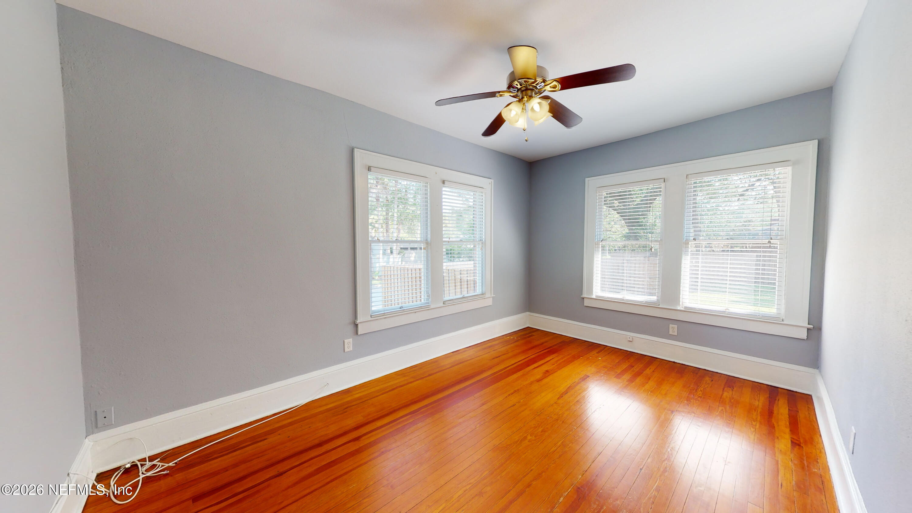 1292 Wolfe Street Jacksonville, FL 32205 - Photo 16 of 27 wooden floor in an empty room with a window