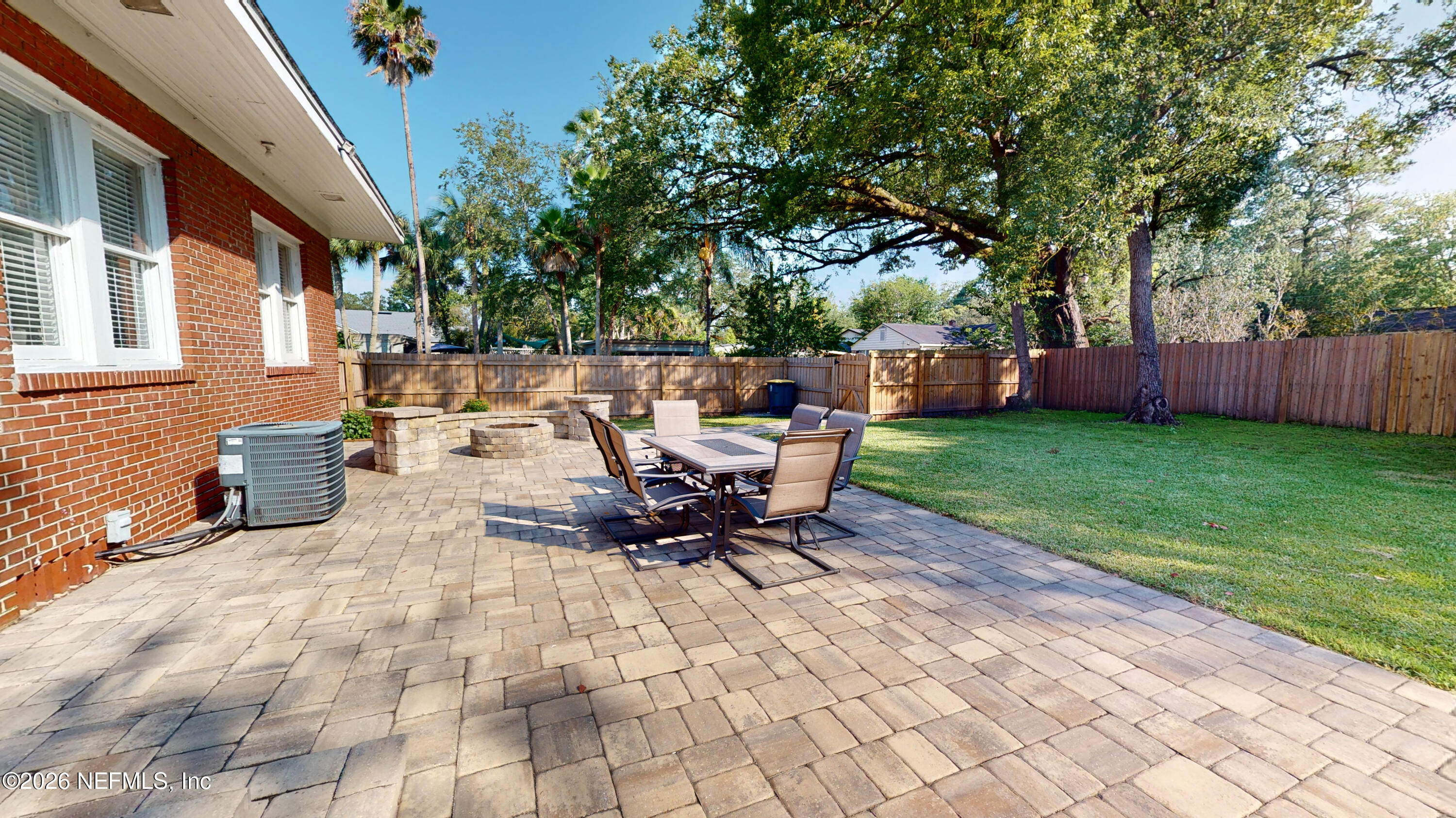 1292 Wolfe Street Jacksonville, FL 32205 - Photo 22 of 27 a view of a patio with a table and chairs
