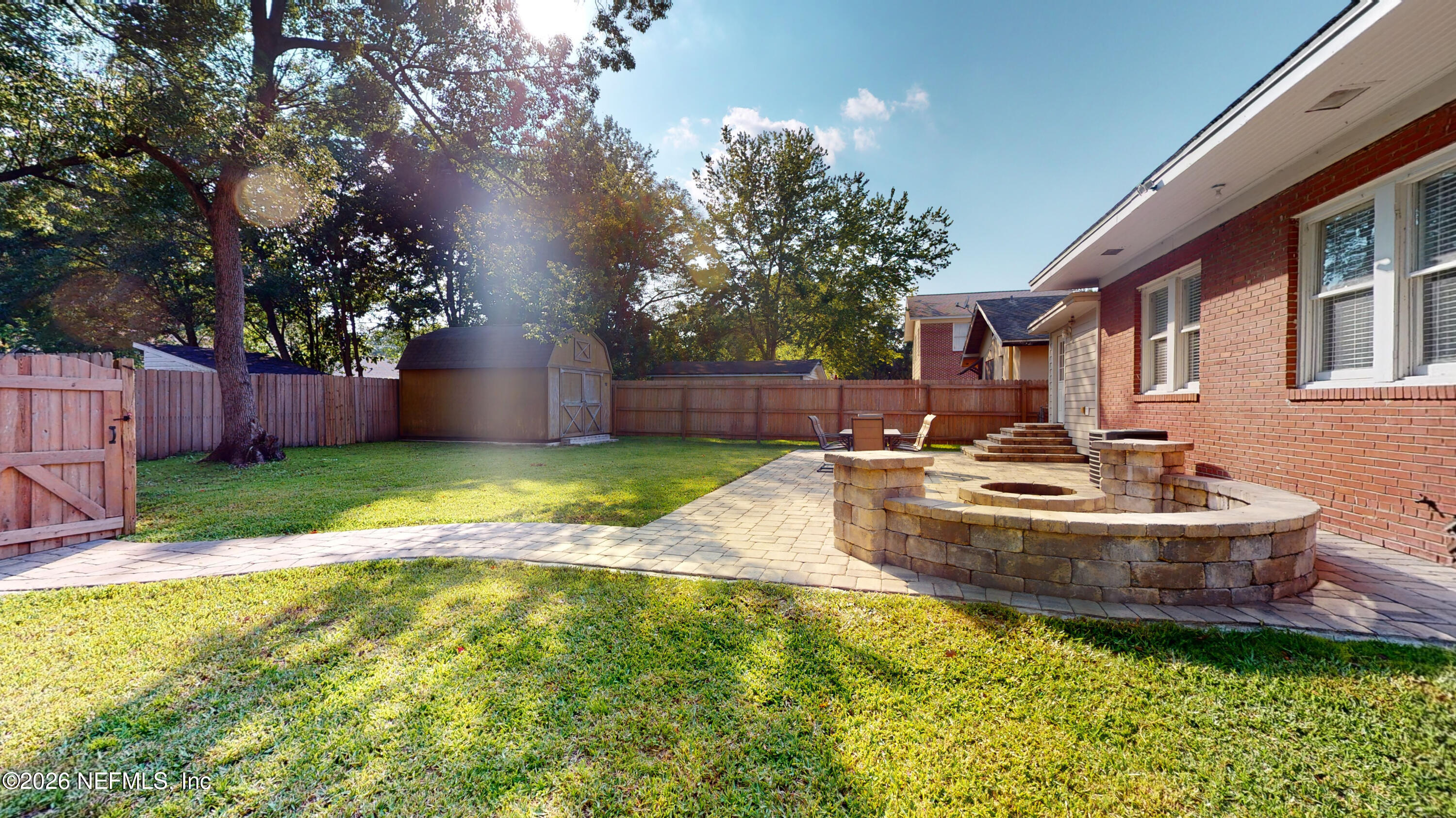 1292 Wolfe Street Jacksonville, FL 32205 - Photo 3 of 27 a view of a swimming pool with a patio