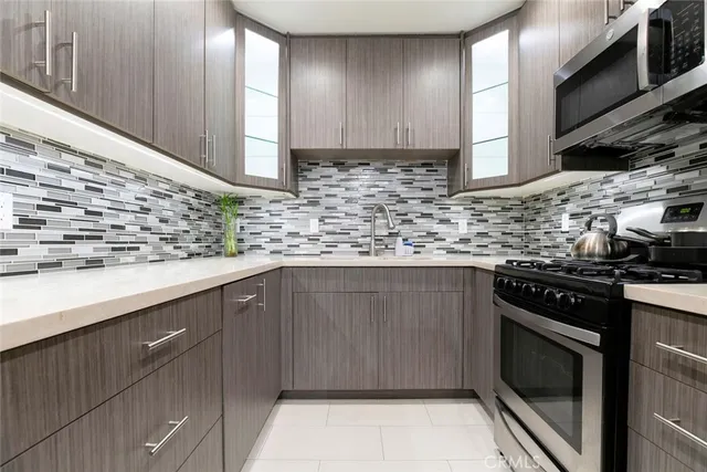 a view of a workspace with furniture and wooden floor